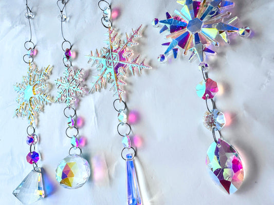 Set of Four Snowflake Sun Catchers.