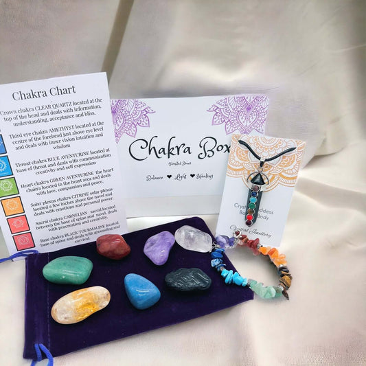 Chakra gift box containing chakra stones, chakra bracelet and chakra pendant