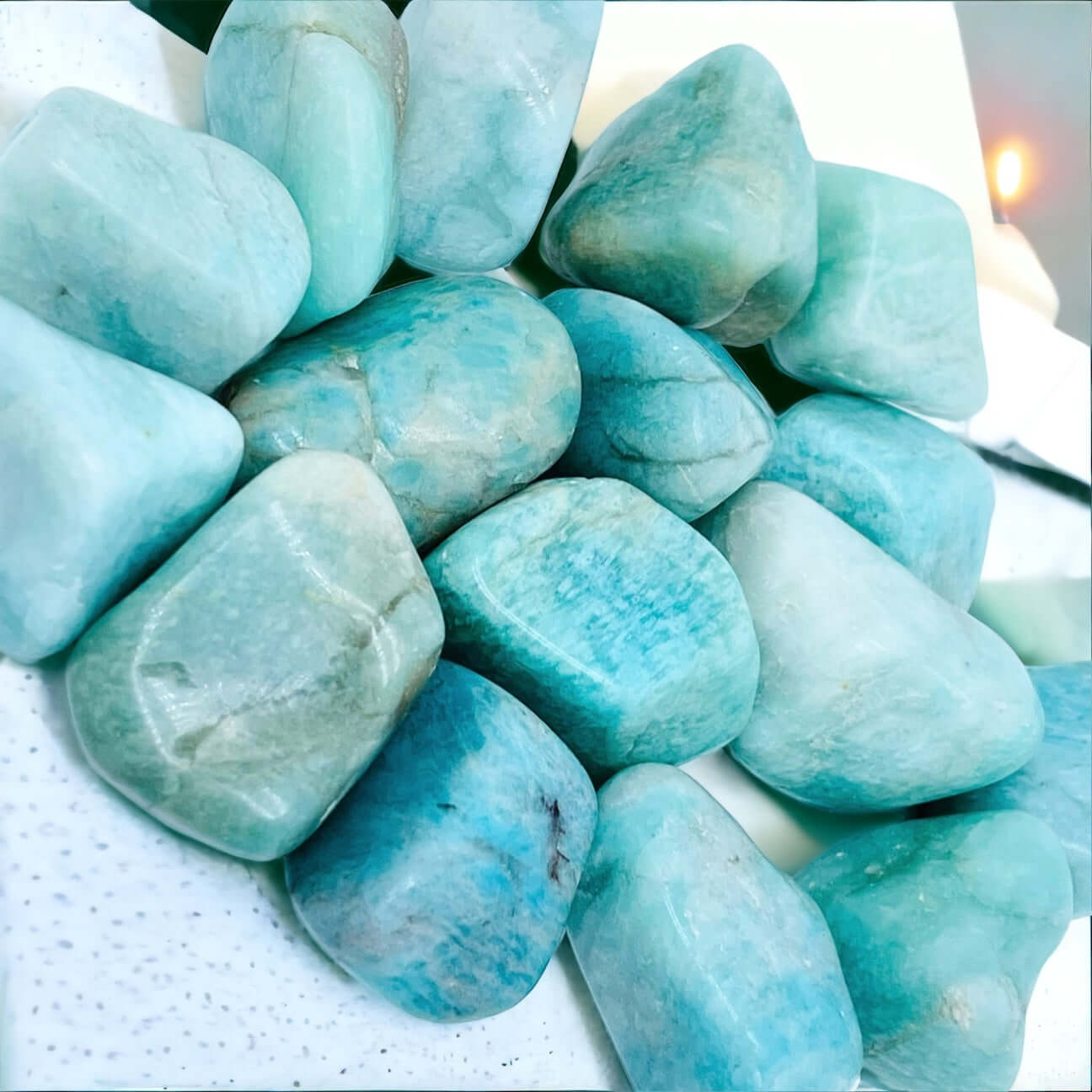 Several tumbled amazonite crystals. 