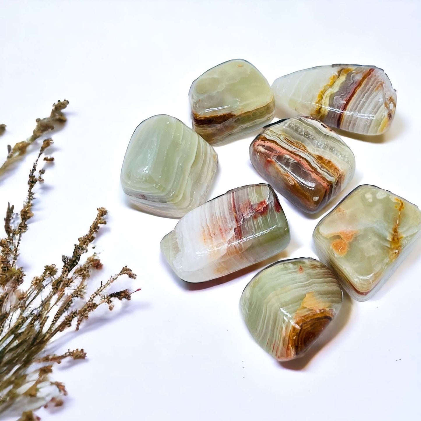 Several Banded green calcite stones 