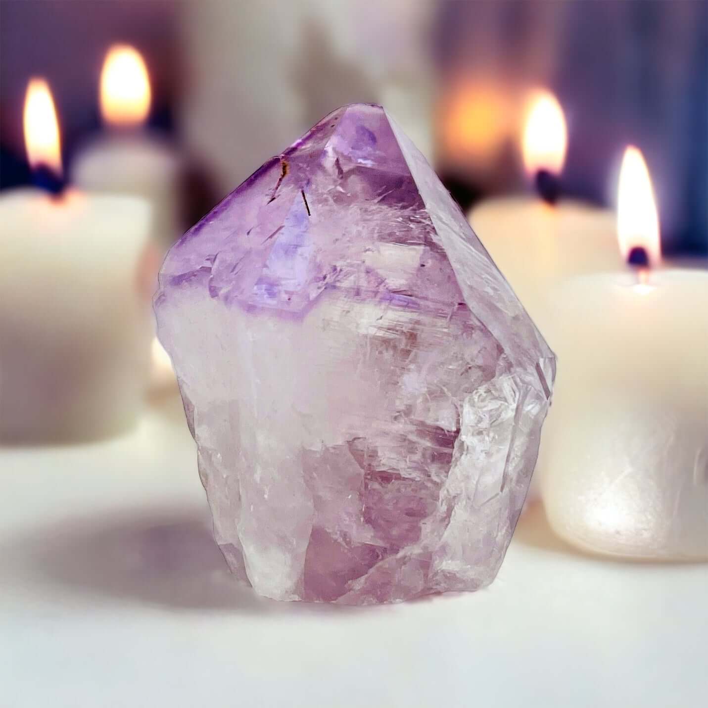 Amethyst point on white background