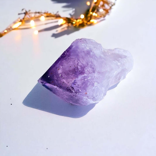 Amethyst point on white background 