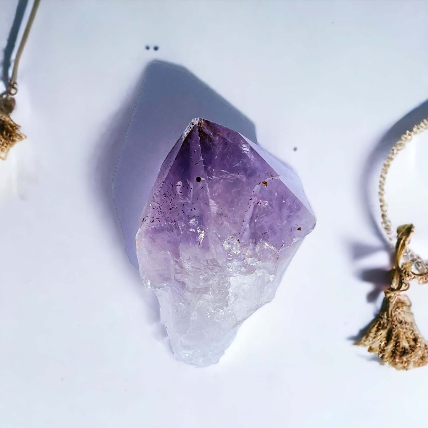 Amethyst point on white background