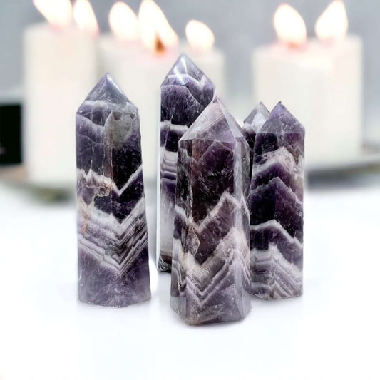 Several chevron amethyst points. 