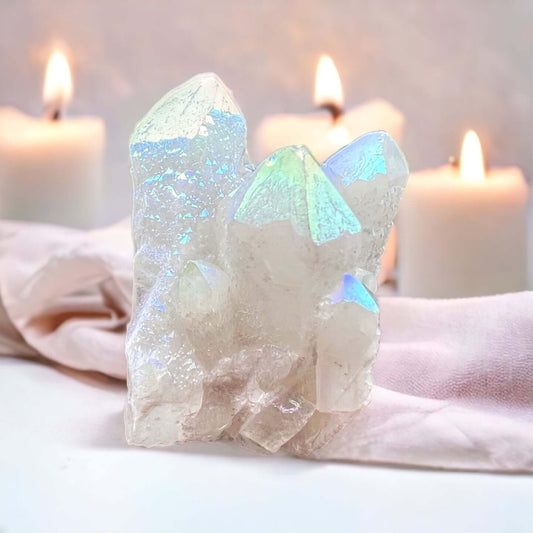 Angel aura cluster with candles in background