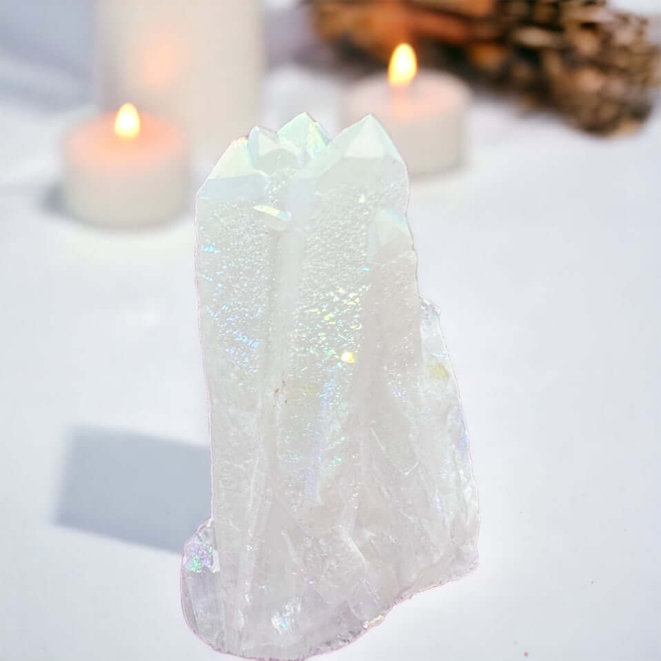 Angel aura cluster with candles in background