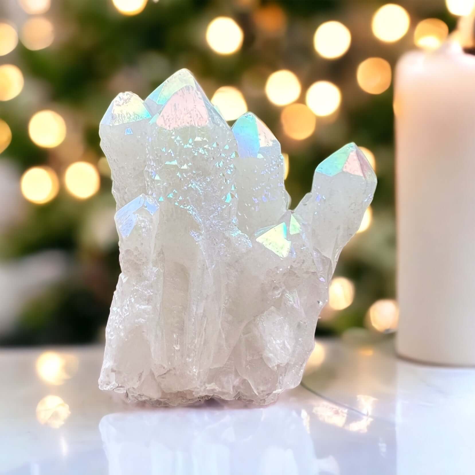 Angel aura cluster with candles in background