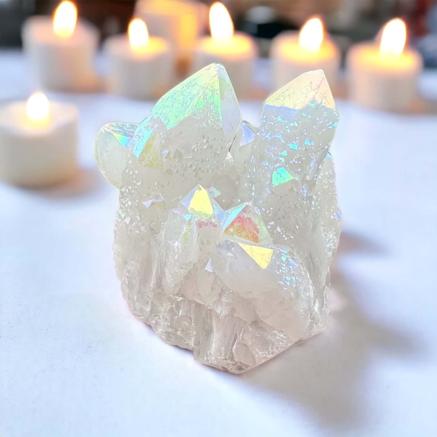 Angel aura cluster with candles in background