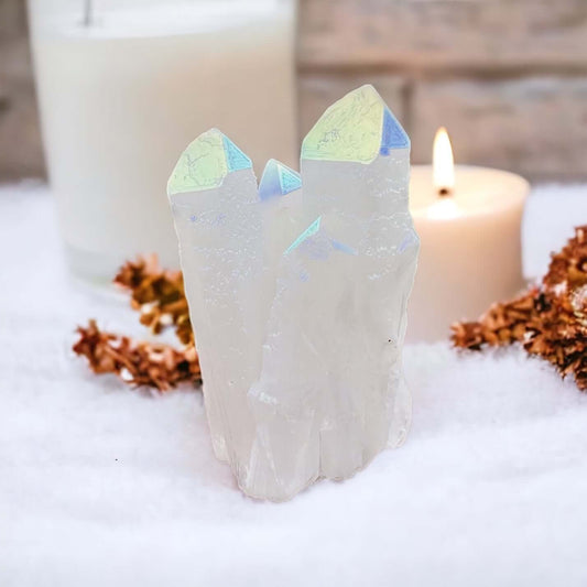 Angel aura cluster with candles in background