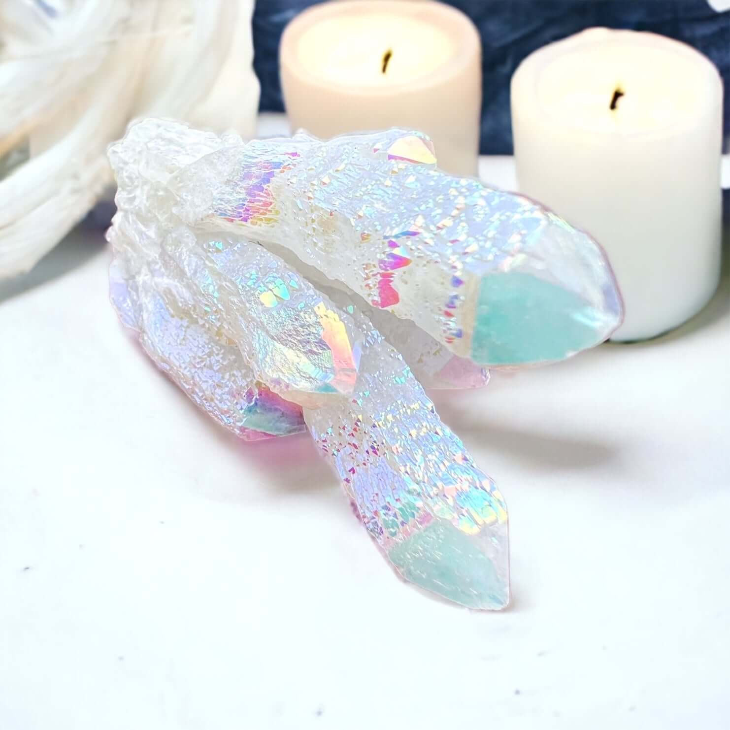 Angel aura cluster with candles in background