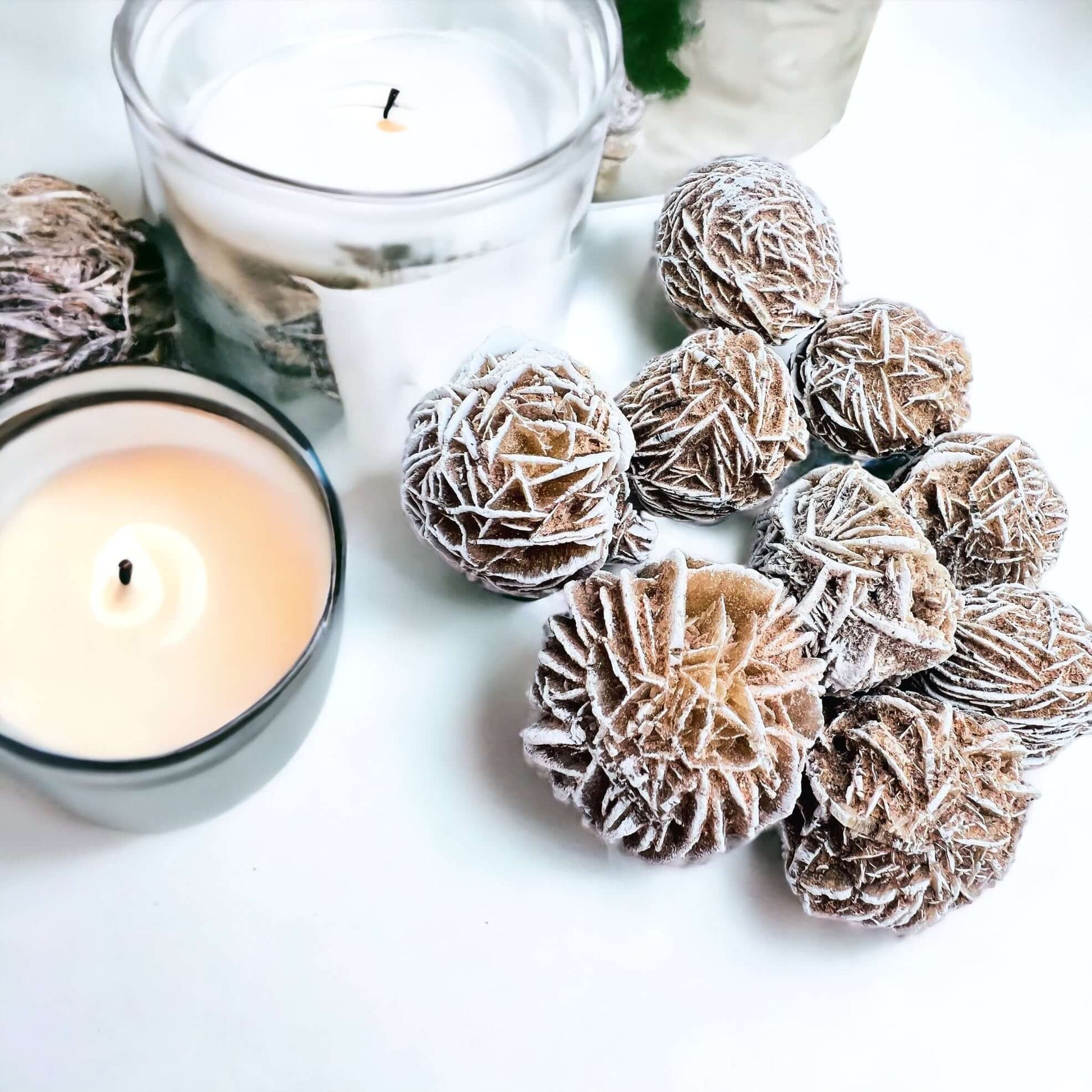 Desert Rose crystals on white surface. 