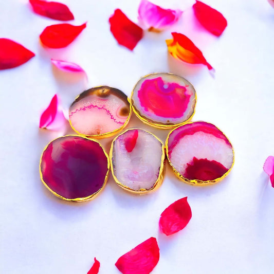 Pink agate pop socket with gold edge.