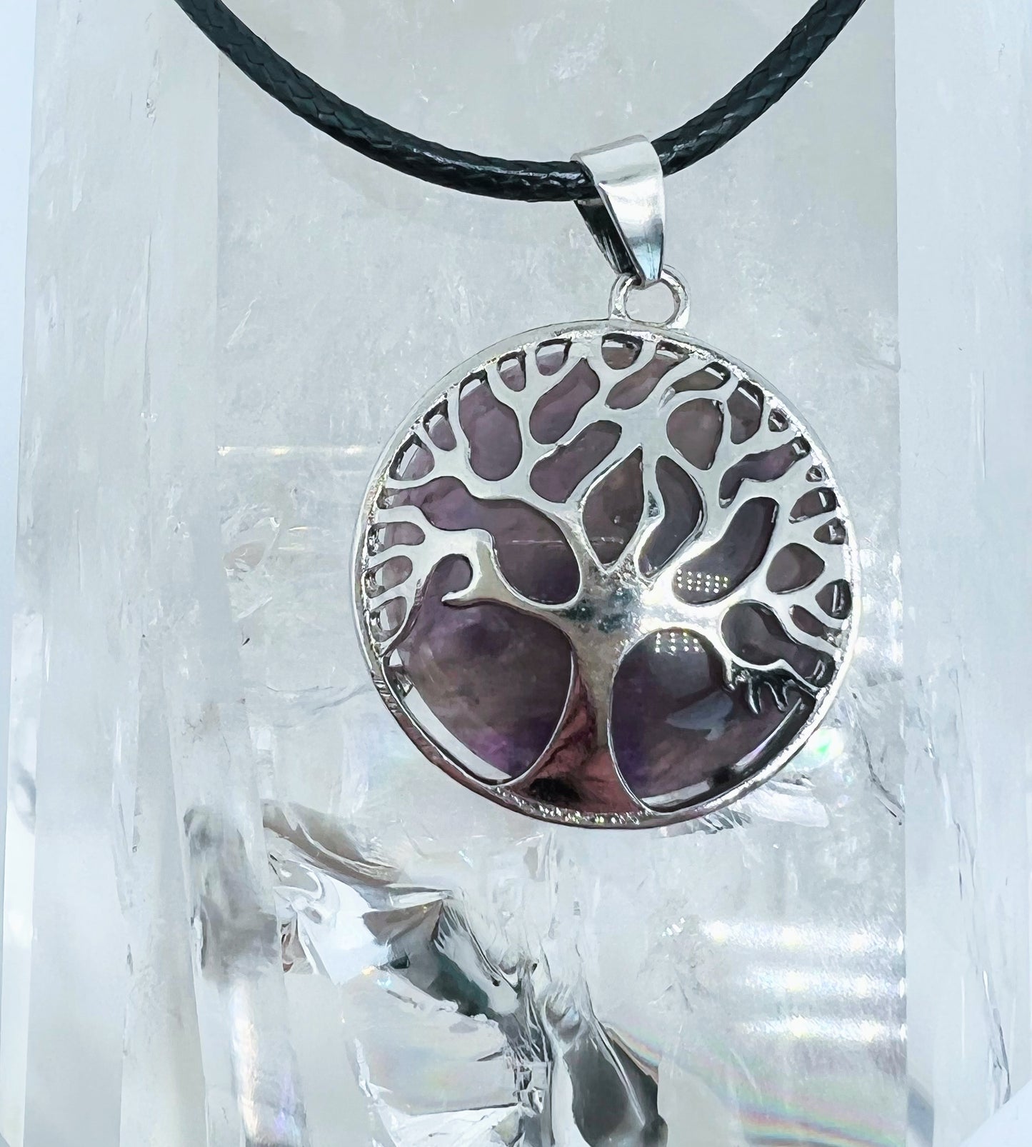 Tree of life round crystal pendants.