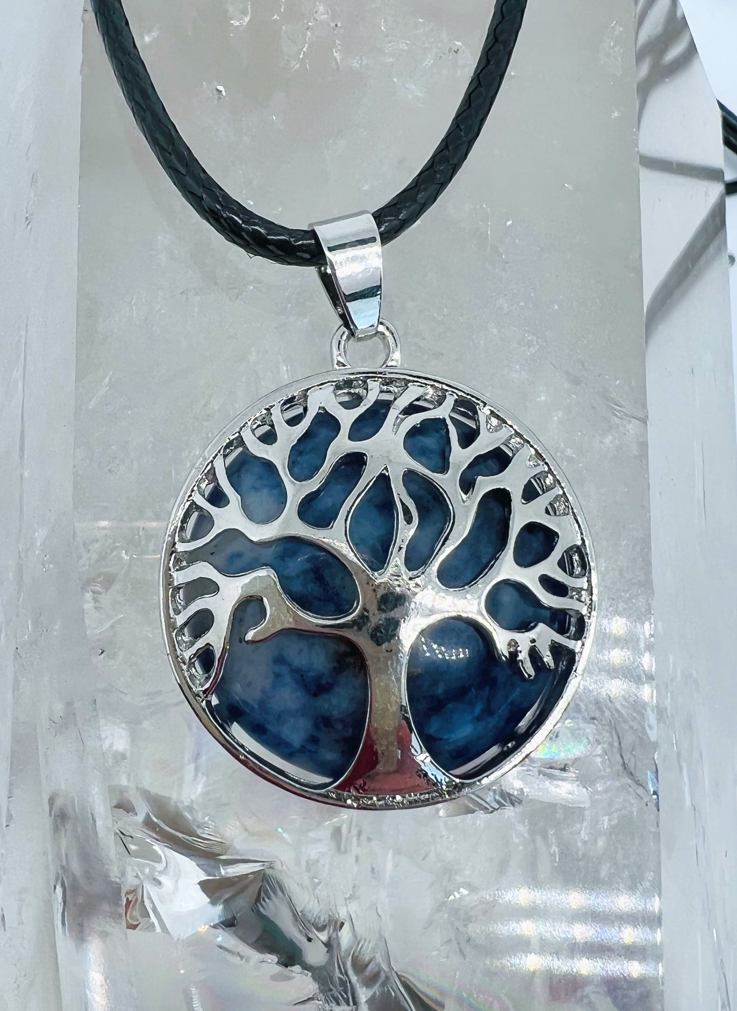 Tree of life round crystal pendants.