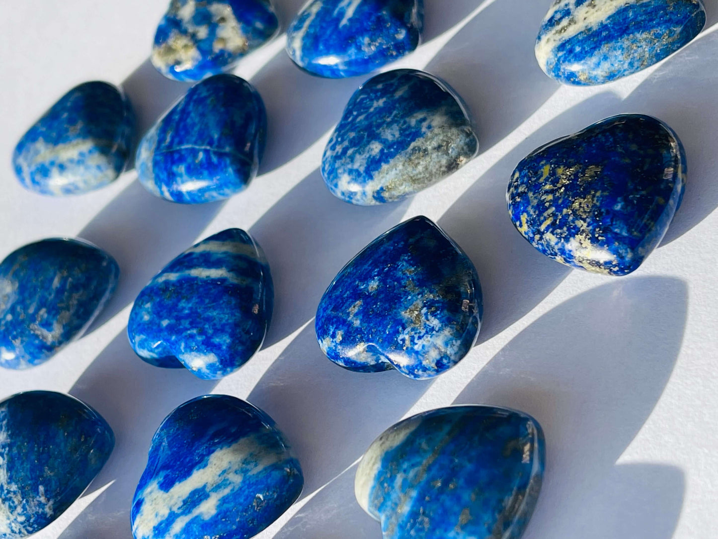 Lapis Crystal Hearts on white background 