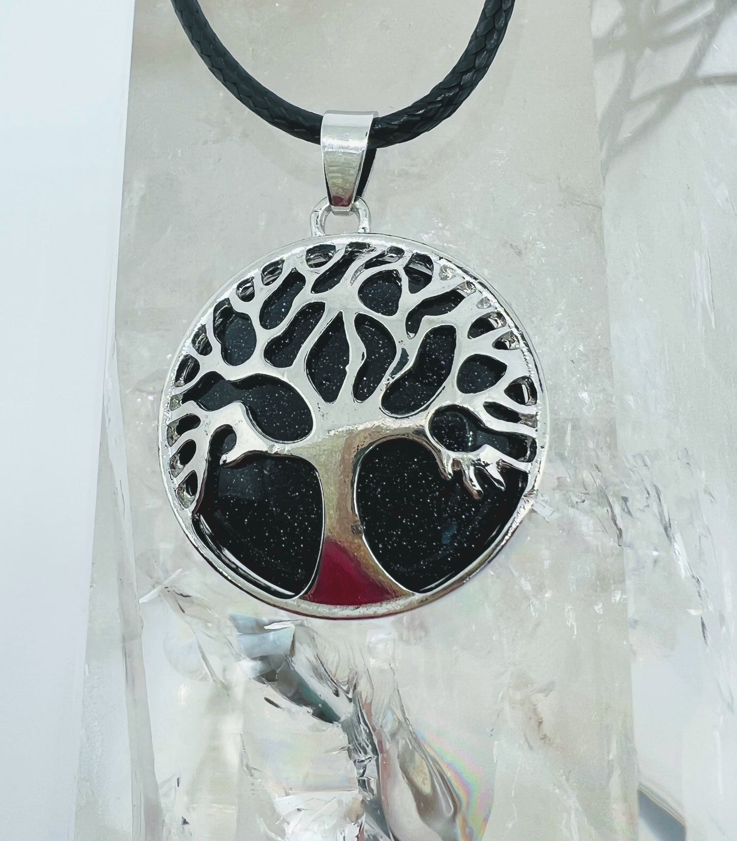 Tree of life round crystal pendants.