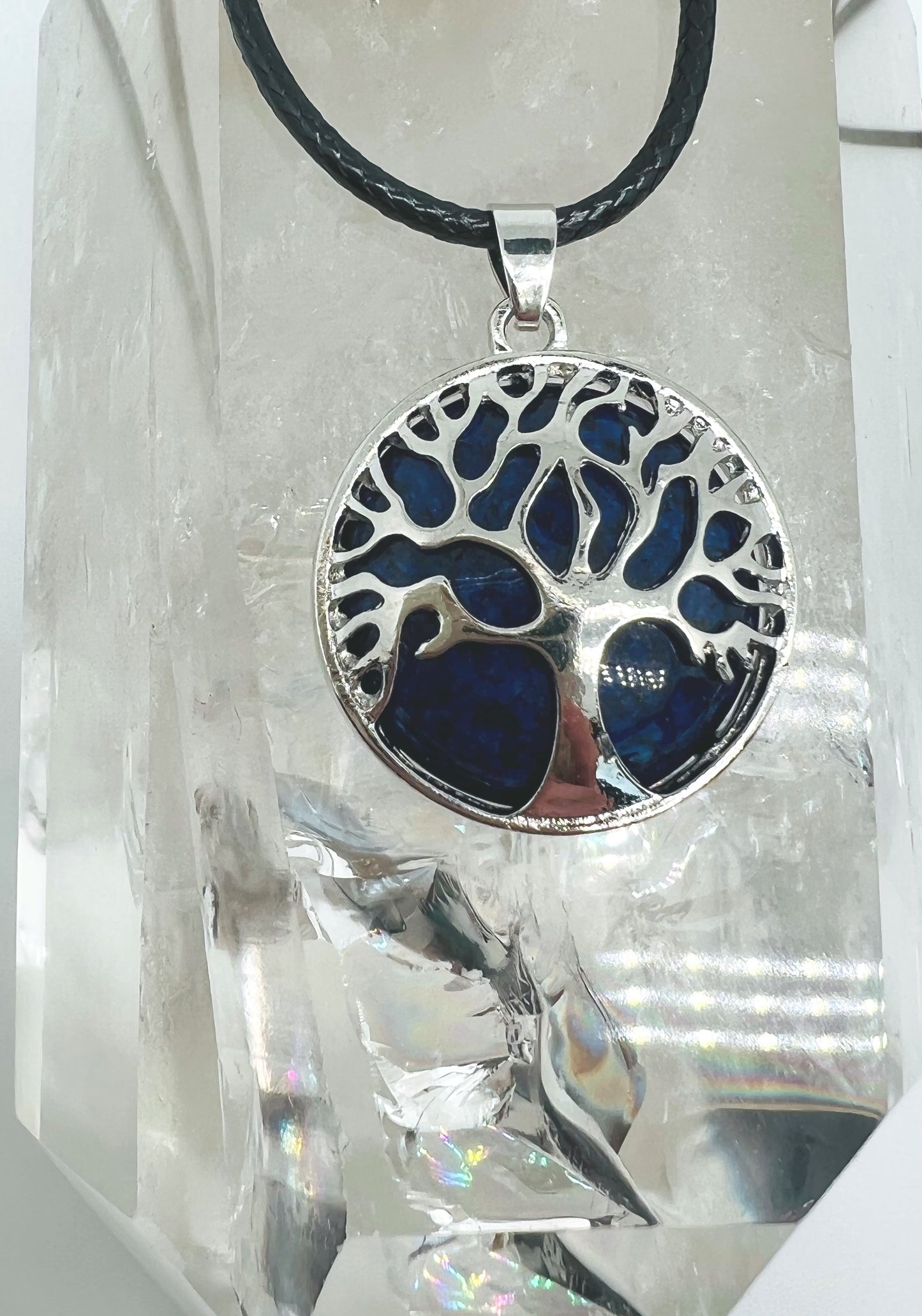 Tree of life round crystal pendants.