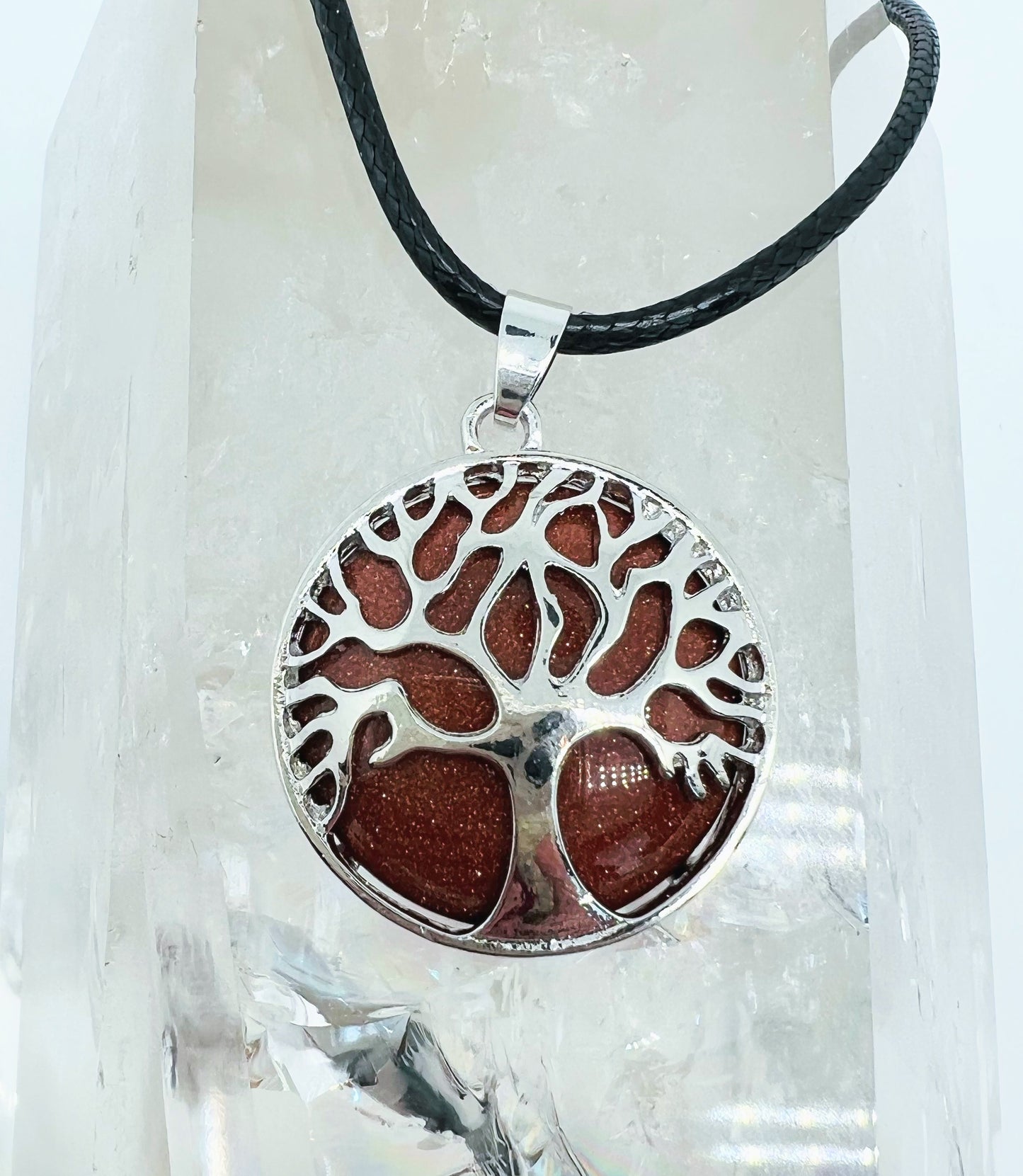 Tree of life round crystal pendants.