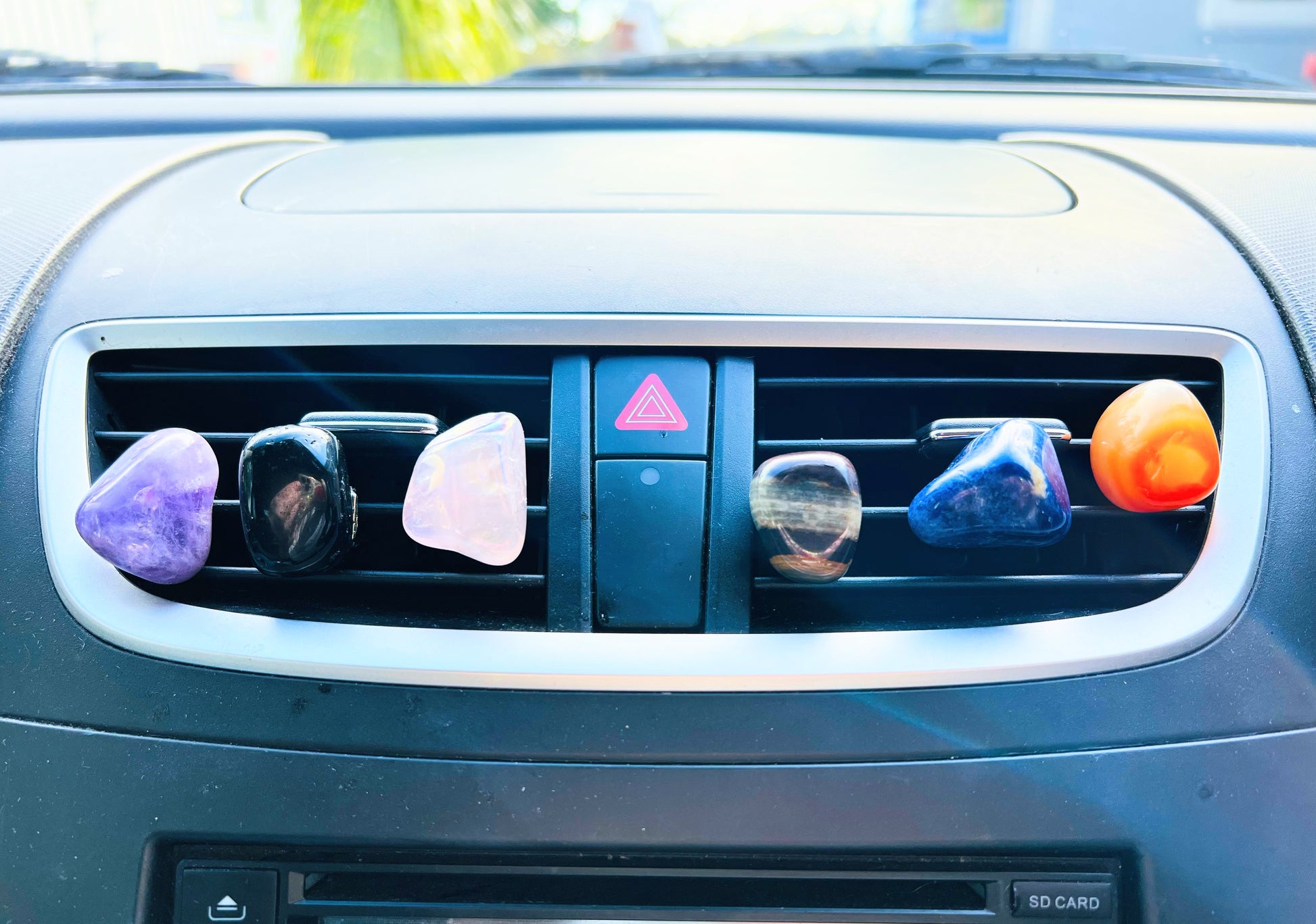 crystal car vent crystals shown on a car vent.