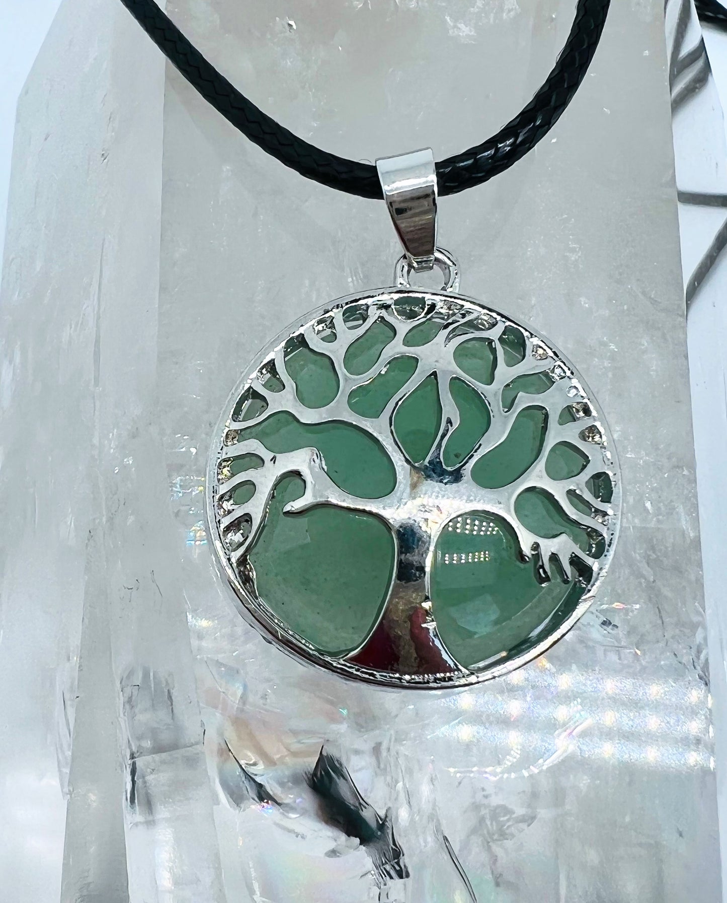 Tree of life round crystal pendants.