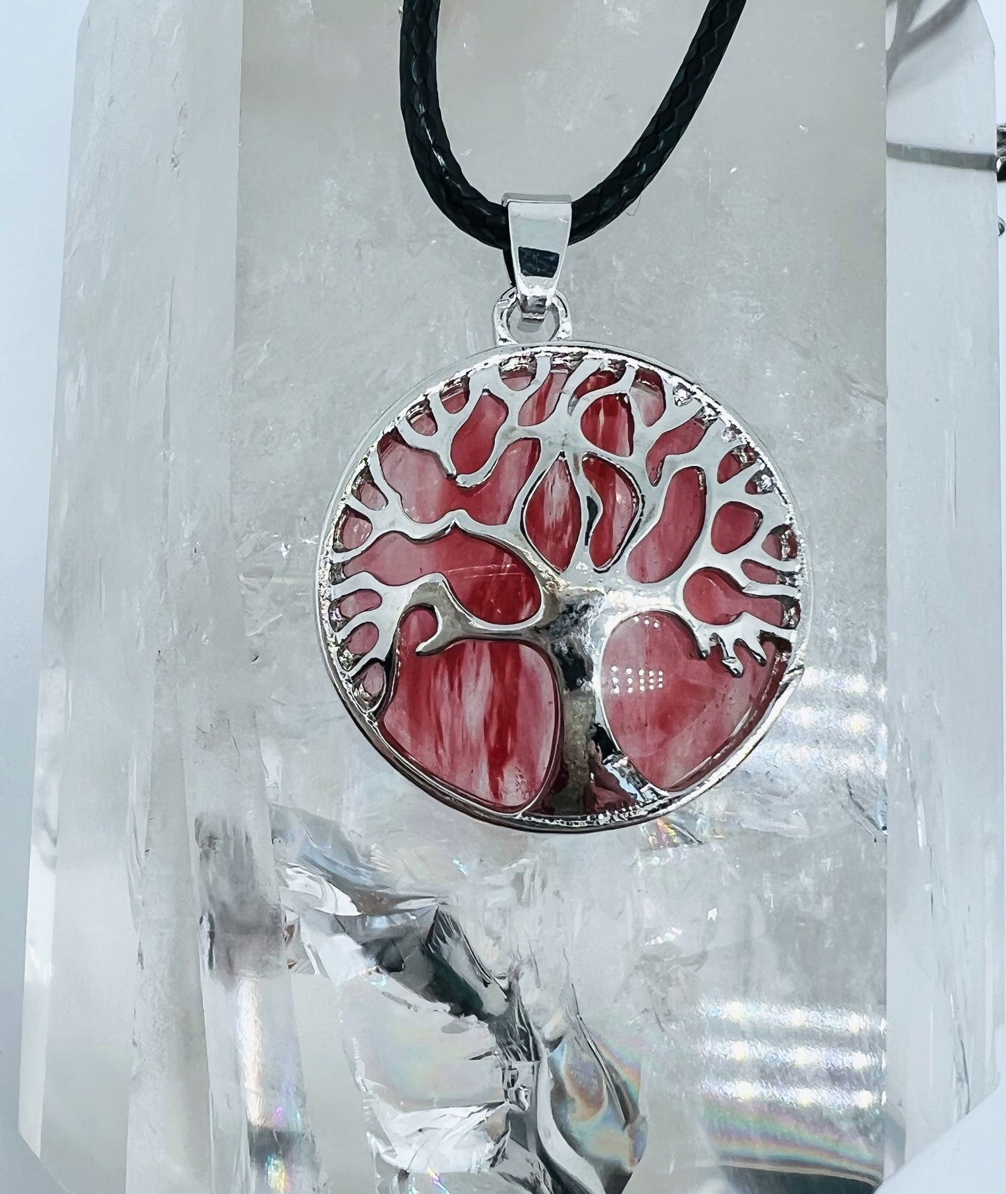 Tree of life round crystal pendants.