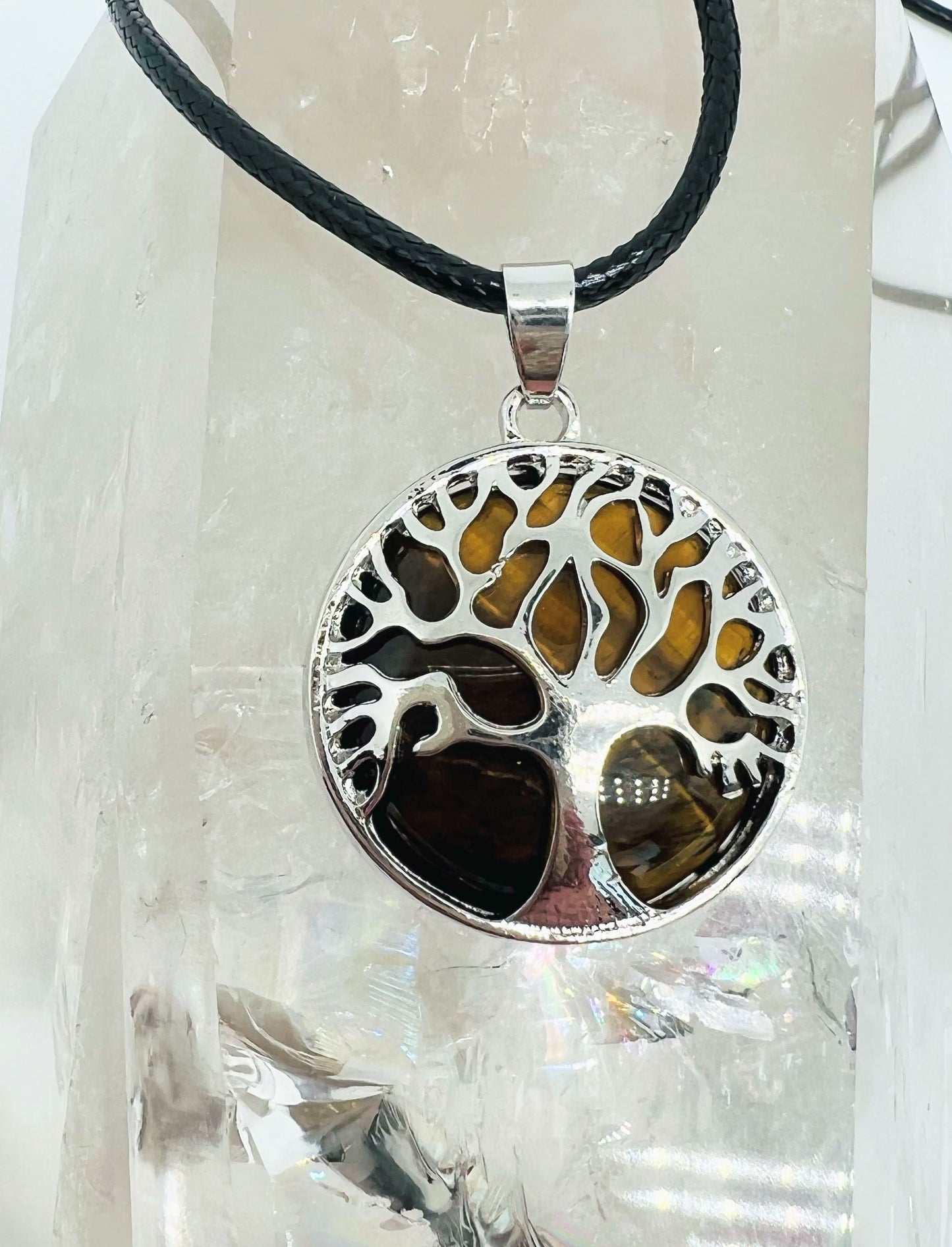 Tree of life round crystal pendants.