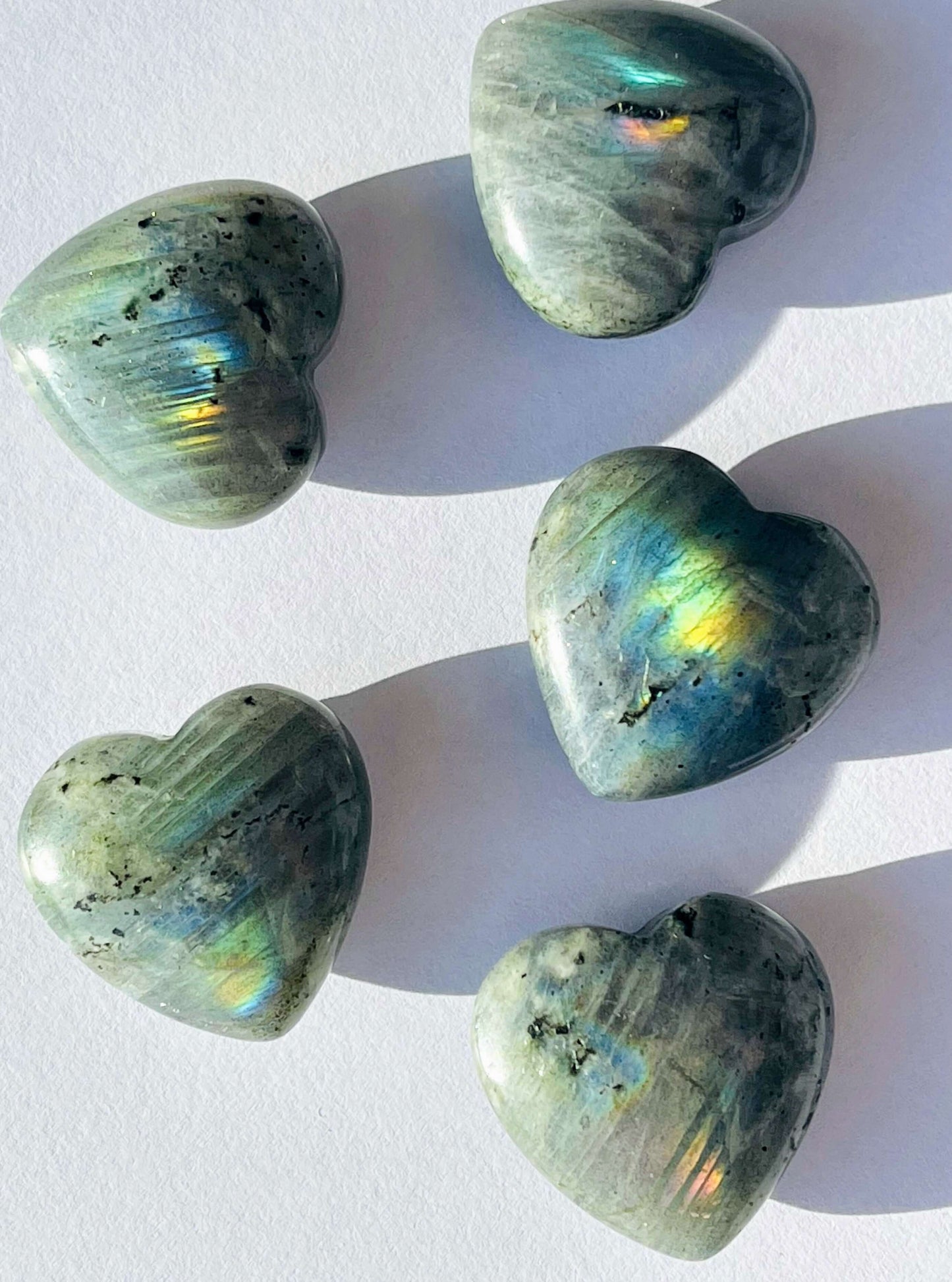 Labradorite Crystal Hearts on white background 