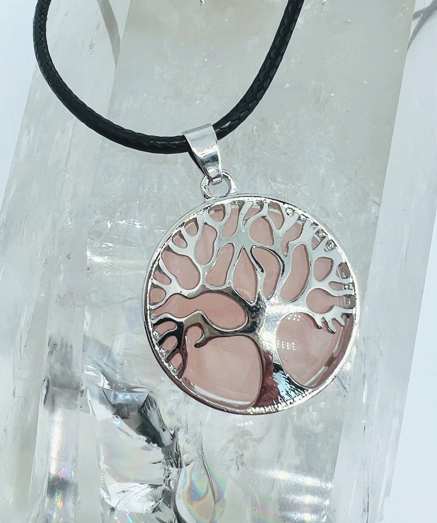 Tree of life round crystal pendants.