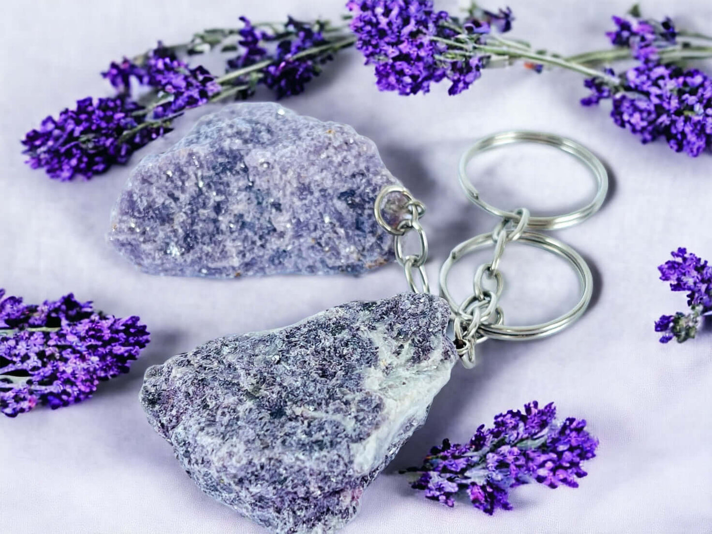 Lepidolite key rings on lavender fabric 